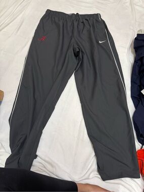 Nike Men’s Black/Gray Track Pants with Red 'A' Accent